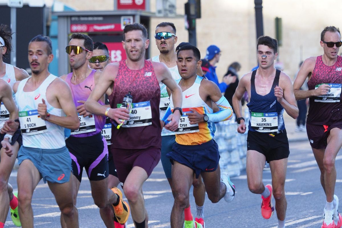 Jonny Mellor taking an energy gel during a marathon